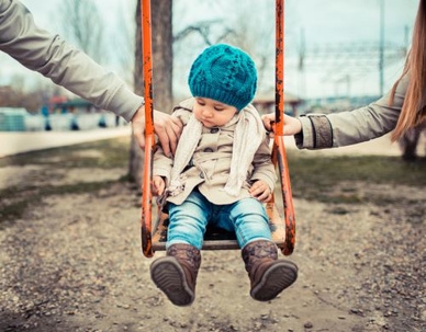 Parents Fighting Over Child on Swing