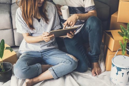Couple Looking at Tablet